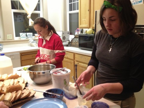 Isabelle & McKenna set out toasted bagels + toppings for breakfast