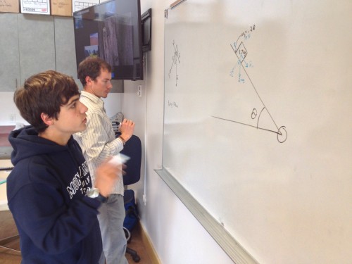 Dan and Isaac work an adjustable inclined plane problem.